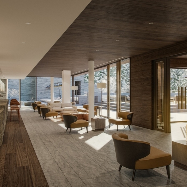 Elegante Hotellobby mit Designermöbeln und Ausblick auf eine Winterlandschaft