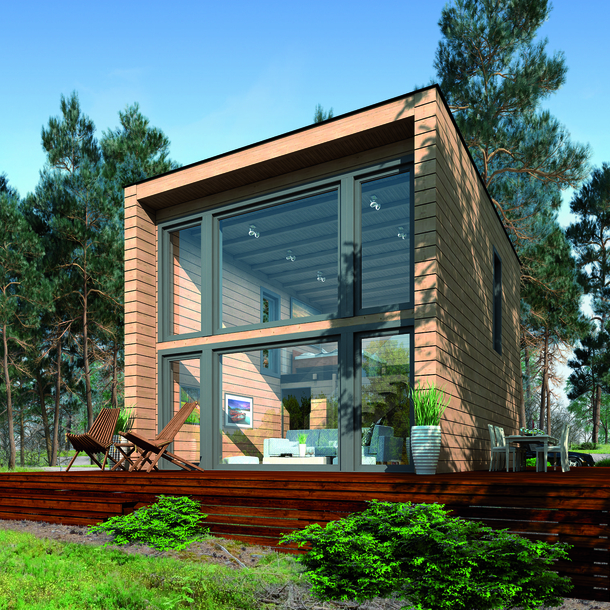 Ein modernes Blockhaus mit bodentiefer Glasfront und Terrasse im Wald